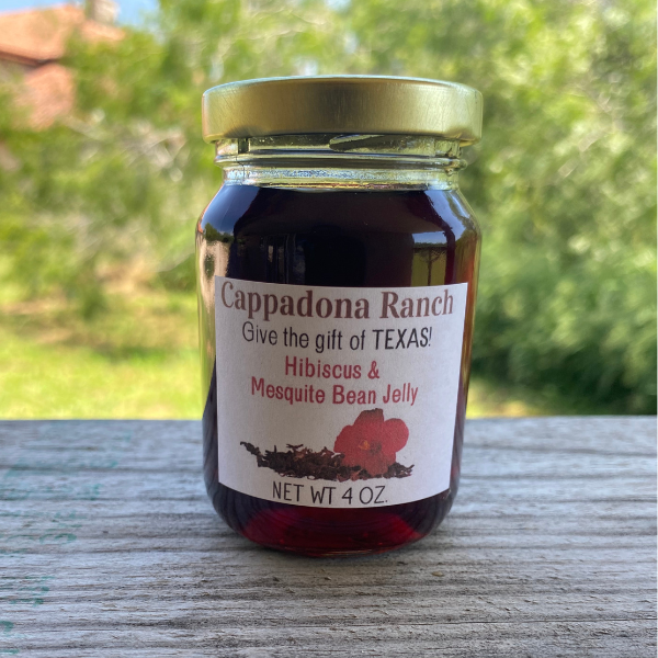 Cappadona Ranch Hibiscus and Mesquite Bean Jelly in glass jar, showcasing Texas-grown ingredients on label